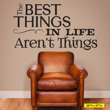The best things in life aren't things wall graphic. Sized at 26"h x 47"w