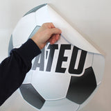 Peel and stick your soccer wall print to any smooth wall.