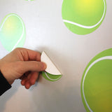 Peel and stick your tennis ball wall prints on any smooth wall surface.