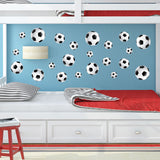 Soccer ball wall graphics applied to bedroom wall.