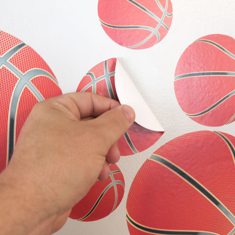 Peel and stick twenty two basketball wall stickers to any smooth surface.